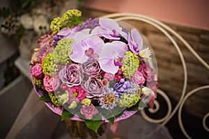 Beautiful bouquet of bright white rose flowers, on table