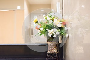 Beautiful bouquet flowers inside room interior.Copy space