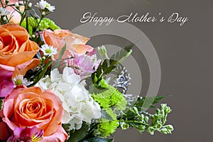 A Beautiful Bouquet of flowers with a special wish of a Happy Mother`s Day on the Left Tom of the Image