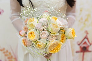 Beautiful bouquet in the hands of the bride