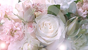 A beautiful bouquet of light pink spray roses. The bride`s bouquet with the glare of the sun. Postcard view. Copyspace. Romantic