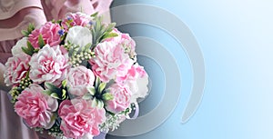 Beautiful bouquet of peonies on blue background. Mothers day, Womens day, Valentines day, birthday or wedding concept.
