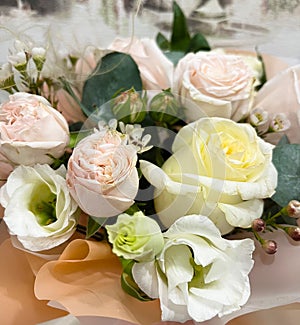 a beautiful bouquet of pink, white and yellow roses