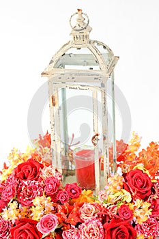 Beautiful bouquet of roses and candles