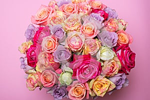 Beautiful bouquet of roses in a gift box. Bouquet of pink roses. Pink roses close-up. on pink background, with space for