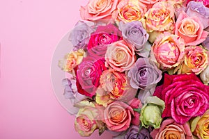 Beautiful bouquet of roses in a gift box. Bouquet of pink roses. Pink roses close-up. on pink background, with space for