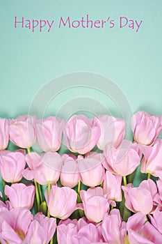 Beautiful bouquet of tulips for Mother`s Day on the bright background.