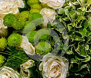 Beautiful bouquet of white roses and green flowers