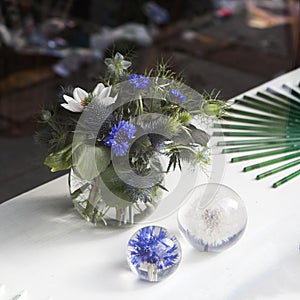 Beautiful bouquet of wild flowers with blue burr, cornflower