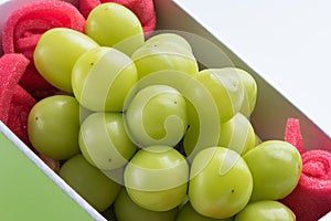 Beautiful boxed Shine Muscat green grape isolated on white background