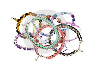 Beautiful bracelets with precious stones isolated on white