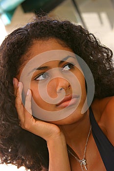 Beautiful brazilian woman looking sad