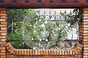 Beautiful brick and Metal Fence with Door and Gate of Modern Style Design Metal Fence Ideas. Front view