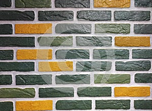 Beautiful brick pattern wall design yellow green dark background wallpaper texture