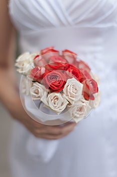 Beautiful bridal bouquet from red and white roses