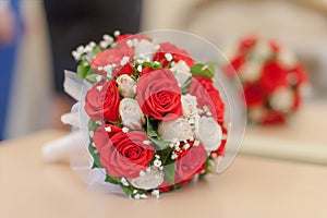 Beautiful bridal bouquet from white and red roses