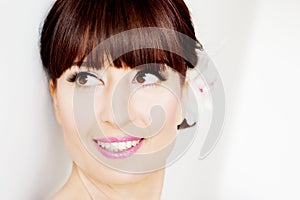 Beautiful bride with bangs face closeup photo