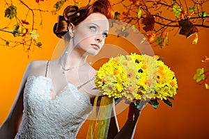 Beautiful bride with a bouquet of flowers