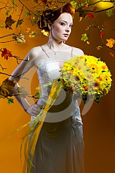 Beautiful bride with a bouquet of flowers