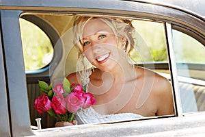 Beautiful Bride in Car on wedding day