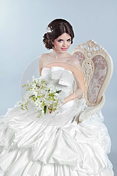 Beautiful bride girl wearing in wedding dress with voluminous sk photo