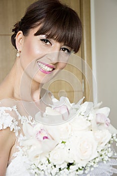 Beautiful bride with her bouquet photo