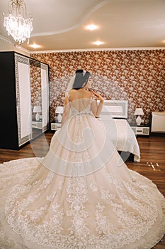 Beautiful bride on her wedding day. Wedding dress on bride. Smile and relax