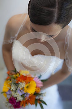 Beautiful Bride holding flowers