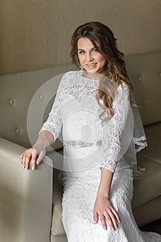 Beautiful bride in luxury hotel room.