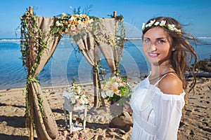 Beautiful bride married at the beach, Bali. Wedding ceremony