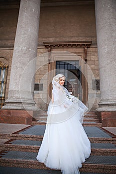 Beautiful bride outdoors. bride with bouquet of flowers outdoor . Beautiful bride posing in her wedding day