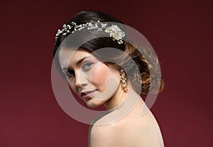 Beautiful Bride Portrait wedding makeup and hairstyle, girl in diamonds tiara, jewelry model