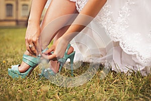 Beautiful bride preparing to get married in white dress and fast