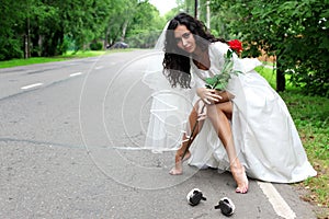 Beautiful bride at the road