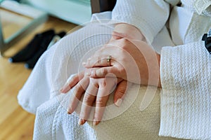 Beautiful bride`s hands in wedding day.