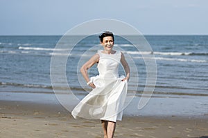 Beautiful bride by the sea