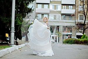 Beautiful bride with tattoo at wedding morning