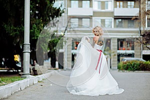 Beautiful bride with tattoo at wedding morning