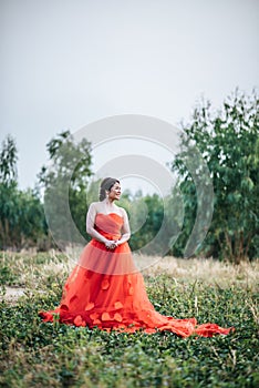 Beautiful bride in wedding dress posting