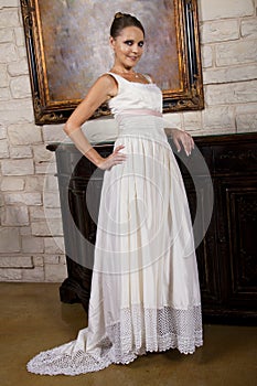 Beautiful Bride In Wedding Gown Wearing A Necklace