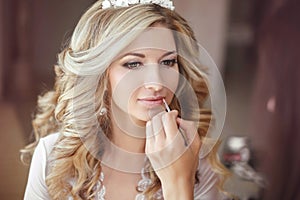 Beautiful bride woman with wedding makeup and hairstyle. Stylist