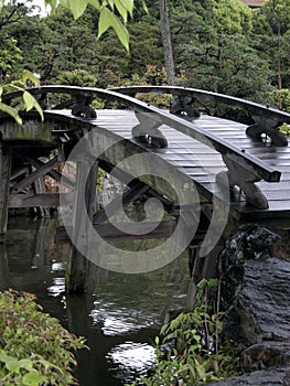 Beautiful bridge in a Japanese garden in Japan photo