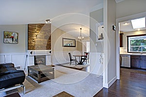 Beautiful bright home interior with vaulted ceiling.