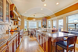 Beautiful bright kitchen room with walkout deck photo