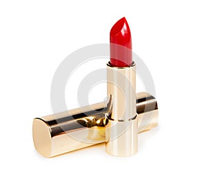 Beautiful bright lipstick in a gold box isolated on white background