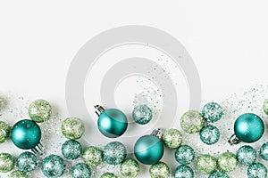 Beautiful, bright, modern Christmas holiday ornaments decorations in contemporary blue and green colors on white background