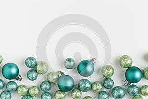 Beautiful, bright, modern Christmas holiday ornaments decorations horizontal border on white background