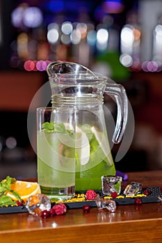 Beautiful, bright spring-summer cocktails made from freshly squeezed fruits and vegetables, on a loft background