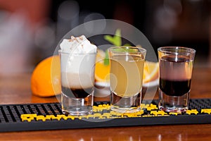 Beautiful, bright spring-summer cocktails made from freshly squeezed fruits and vegetables, on a loft background