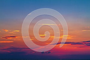 Beautiful bright sunset red clouds in the blue sky